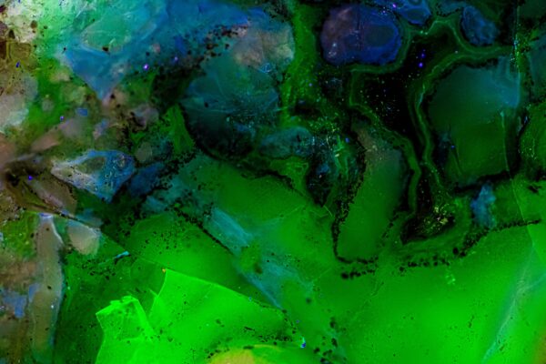This abstract design appears when small crystal of fluorescent element was illuminated with UV light.