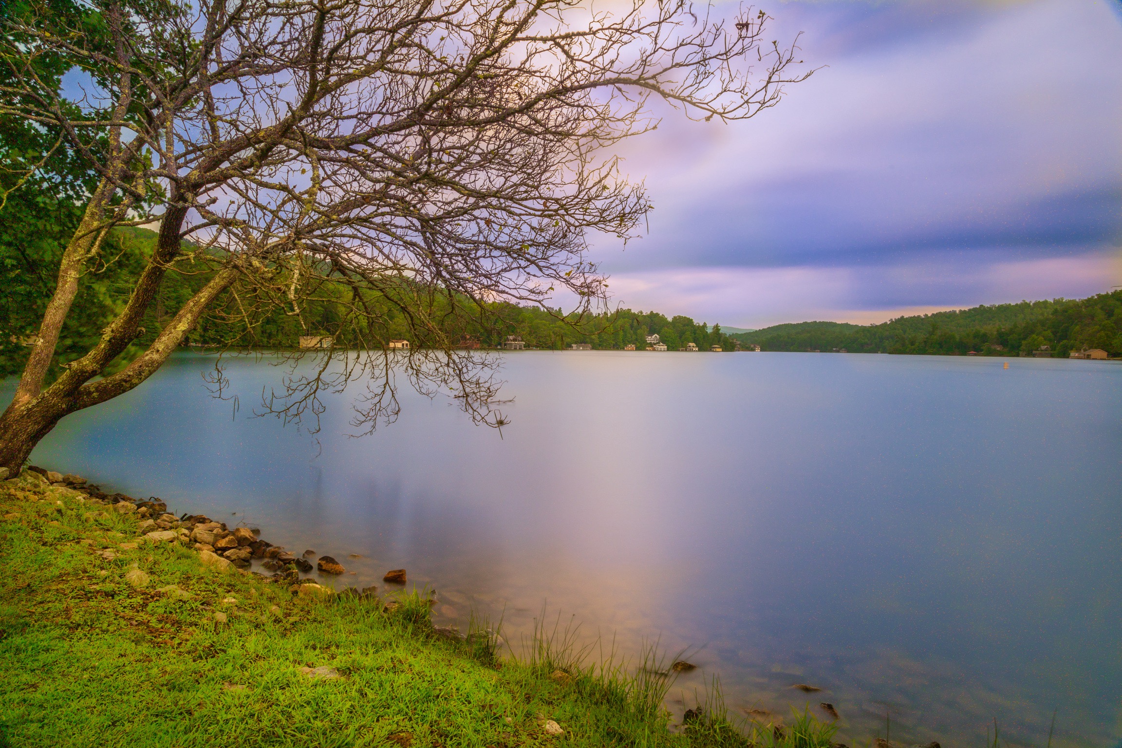 Lake Burton, GA.Long exposure photography using ND filter, express cloud and water movement during exposure. Lake Burton, GA.Long exposure photography using ND filter, express cloud and water movement during exposure.