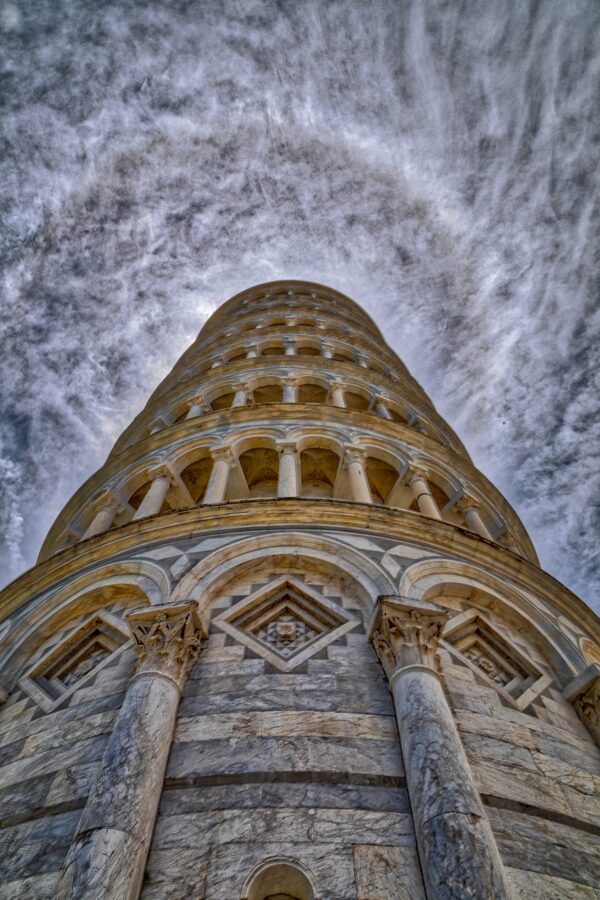 Capturing halo of clouds on top of Pisa tower, Italy.