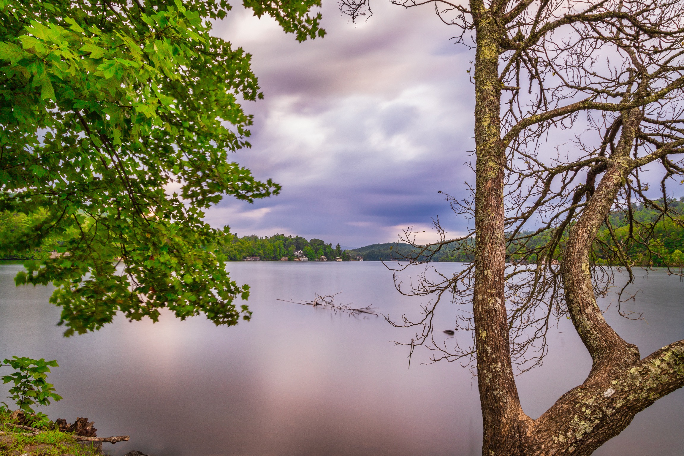 Lake Burton, GA.Long exposure photography using ND filter to express cloud and water movement during exposure. Lake Burton, GA.Long exposure photography using ND filter to express cloud and water movement during exposure.