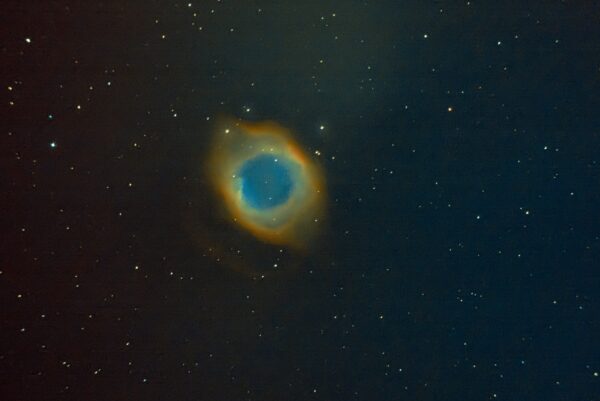 Helix Nebula, { future of our Sun }, about 700 light years away.This Nebula sheds outer layers near the end of its evolution.This is also fate of our Sun after 10 billion years.