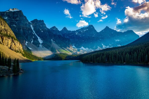 "Lake Moraine" Is a glacially fed lake in Banff National Park Canada.The vibrant blue colors of glacial waters can make any landscape stunning!