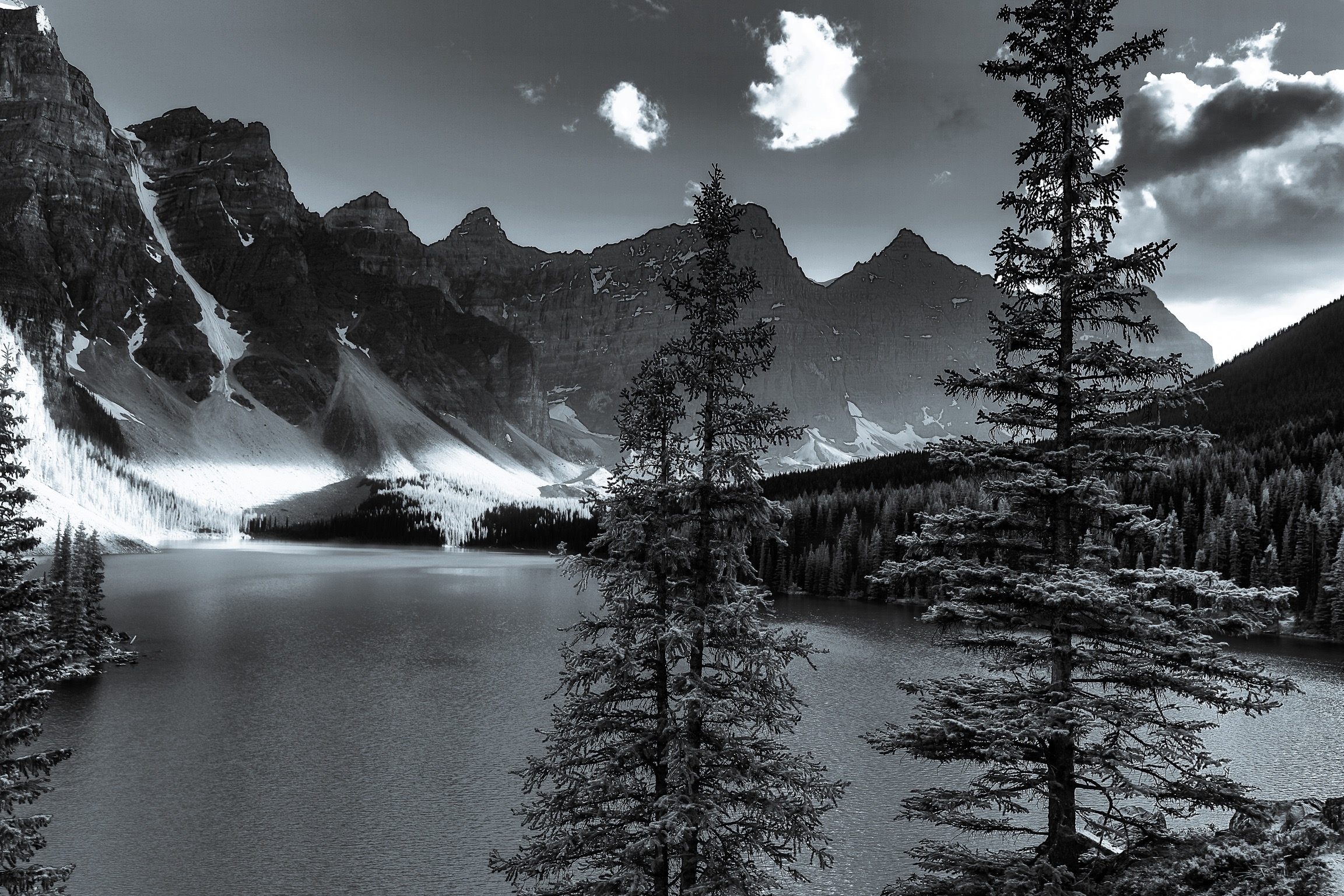 “Lake Moraine” Is a glacially fed lake in Banff National Park Canada.This photograph highlights the magic of lights and shadows. “Lake Moraine” Is a glacially fed lake in Banff National Park Canada.This photograph highlights the magic of lights and shadows.