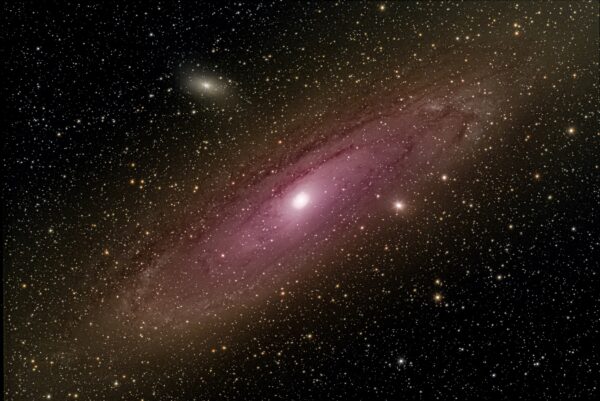 “Andromeda galaxy” 2.5 million light years away.This galaxy is approaching the milky way at 68 miles per second, expected to collide with milky way in 4 billion years.