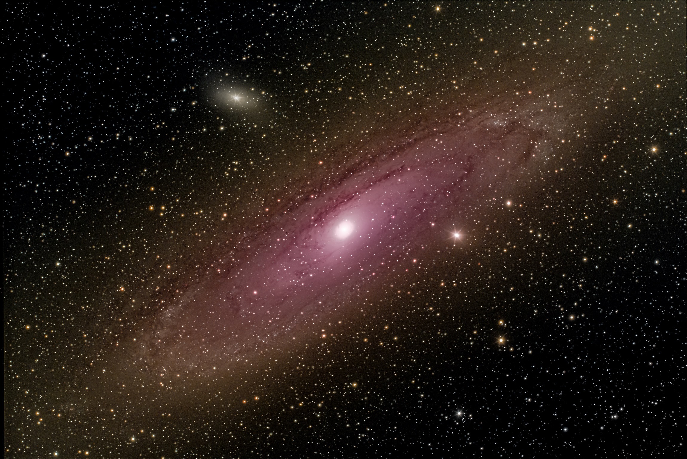 “Andromeda galaxy” 2.5 million light years away.This galaxy is approaching the milky way at 68 miles per second, expected to collide with milky way in 4 billion years.
