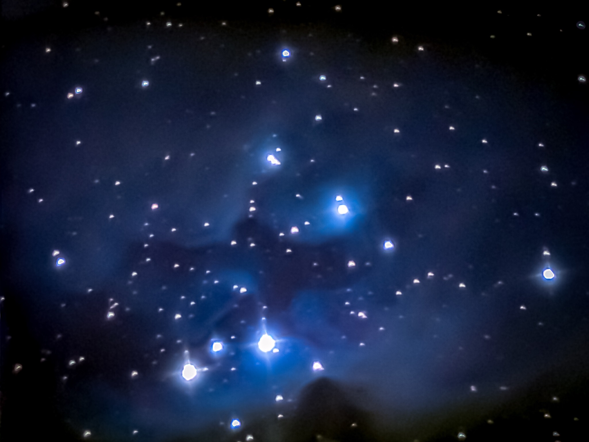 The Running Man Nebula, also known as NGC 1977, vaguely resembles a colorful space ghost sprinting through the stars in the Orion constellation. Located 1,600 light-years away from Earth, this cloud of interstellar dust and gas shares its cosmic neighborhood with two smaller nebulas, NGC 1973 and NGC 1975.